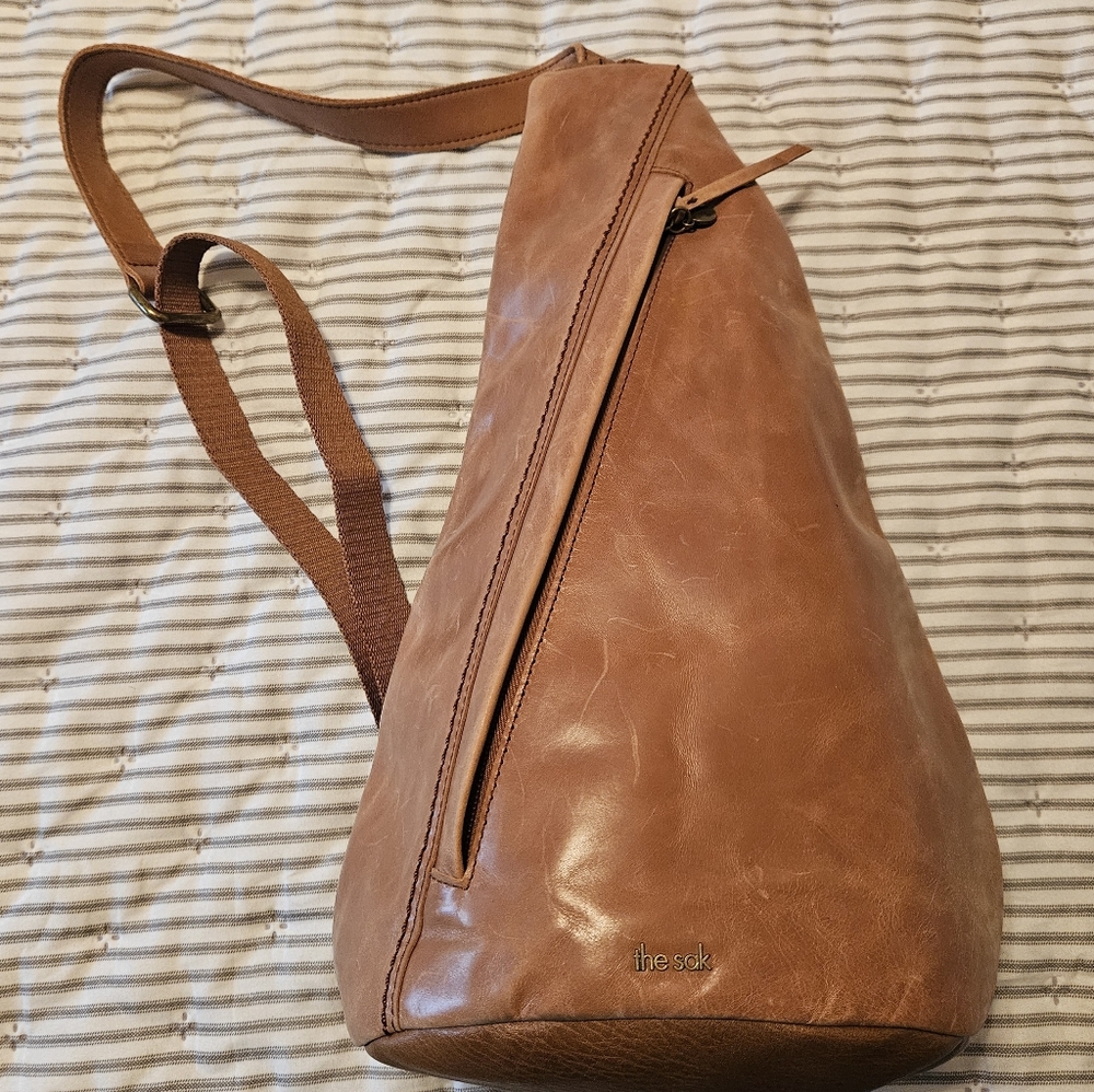 The Sak Leather and Canvas crossbody/sling bag. Carried once.